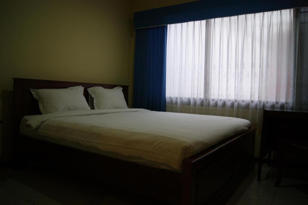 Grand Sumatera Hotel Сурабая Стая снимка